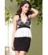 White and black lace-orned peplum party dress