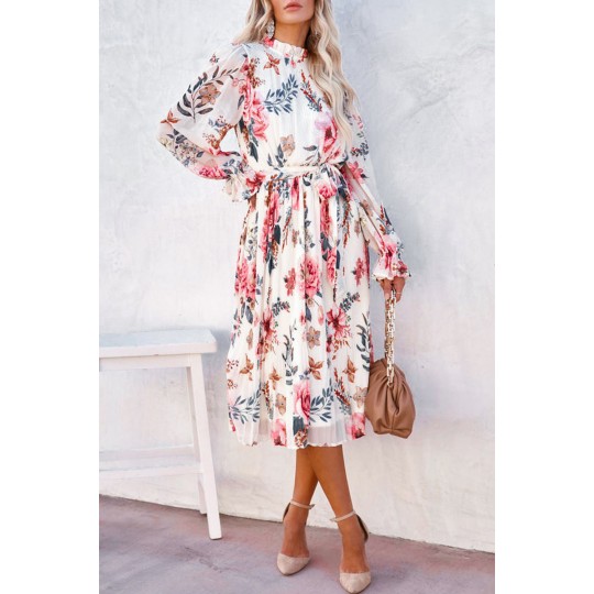 Vit långärmad knivklänning...