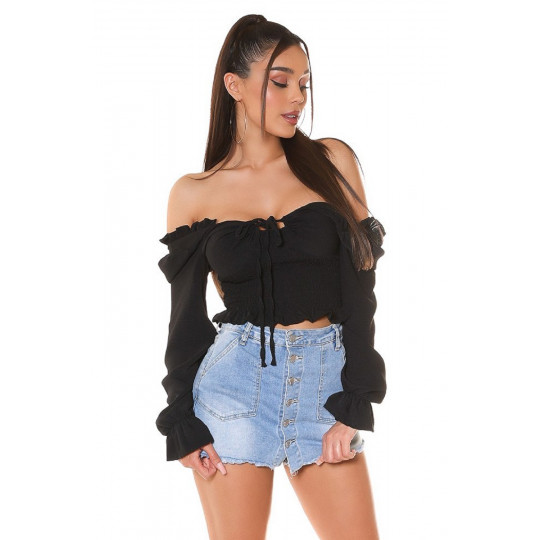 Koucla svart volangtrimmad...