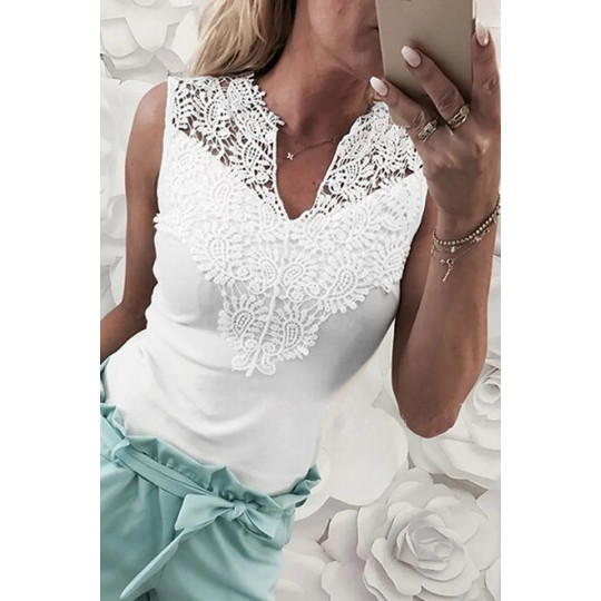 White top with decorative...